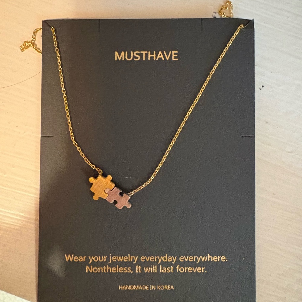 Must Have Gold and Rose Gold Two-Tone Puzzle Pendant Necklace